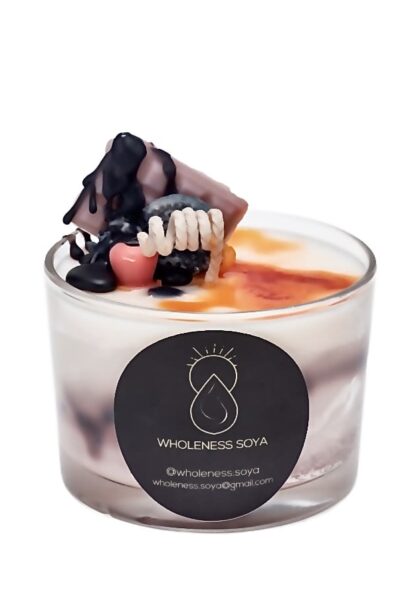 Handcrafted caramel candy scented candle with dessert inspired decoration