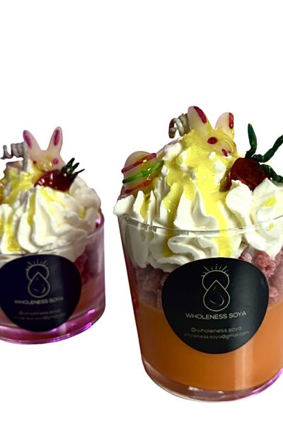 Handcrafted Easter Bunny soy wax candle with whipped wax decoration and carrot cake fragrance