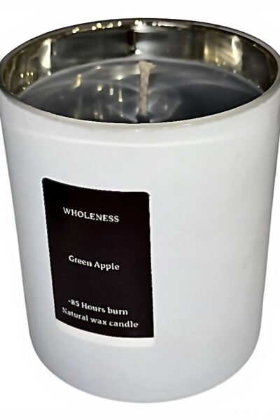 Handcrafted green apple scented candle in white container with fresh fragrance