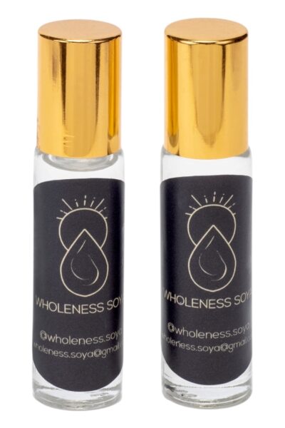 Roll-on perfume bottle with gold cap and portable fragrance design